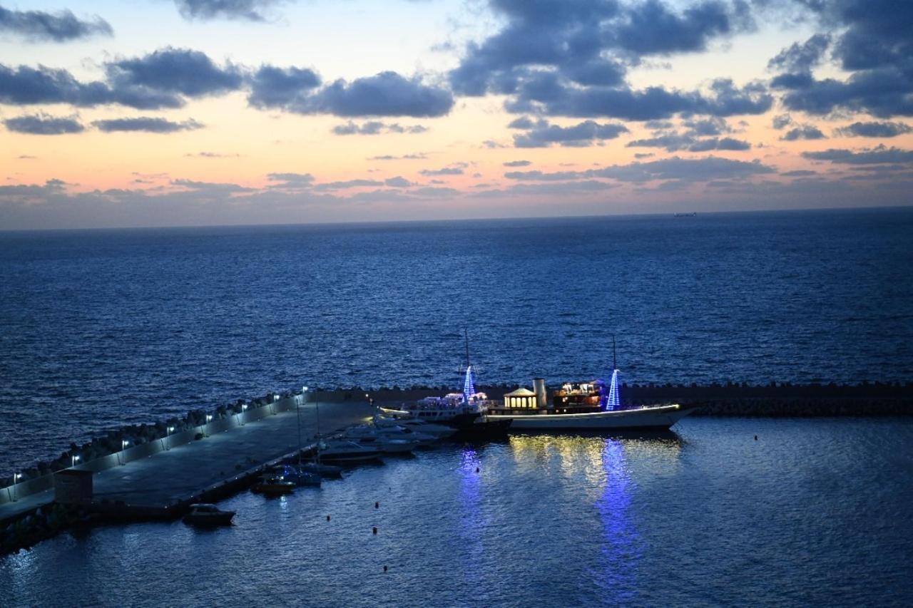 Fleet Club Mahrousa Alexandrië Buitenkant foto The port of Limassol at night